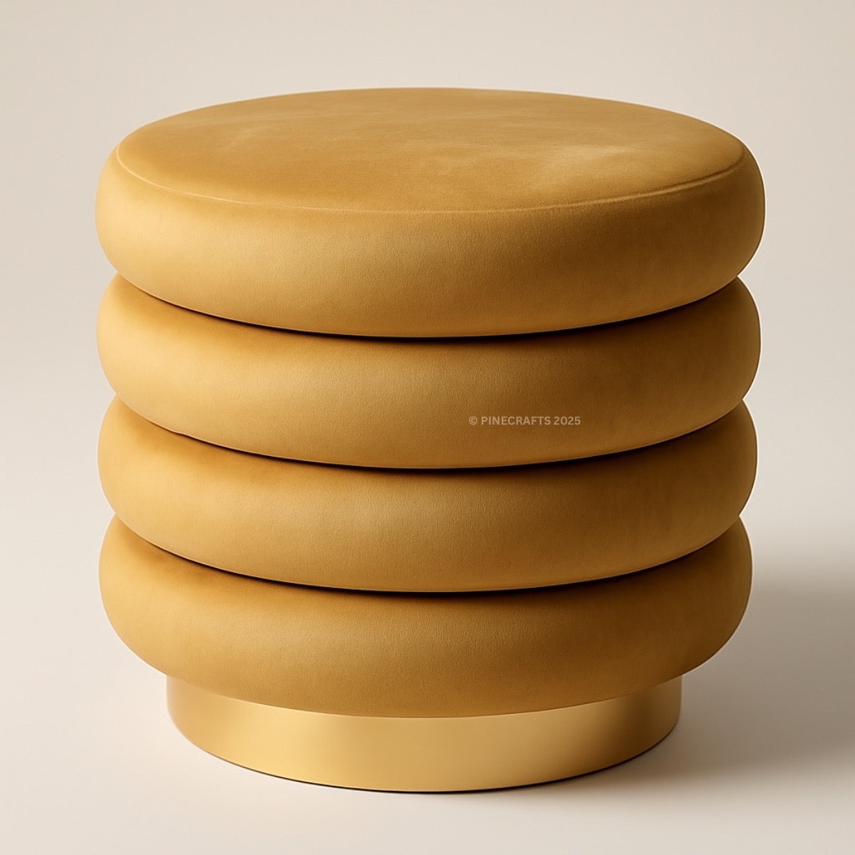 Mustard yellow ottoman with stacked circular designs on a beige background