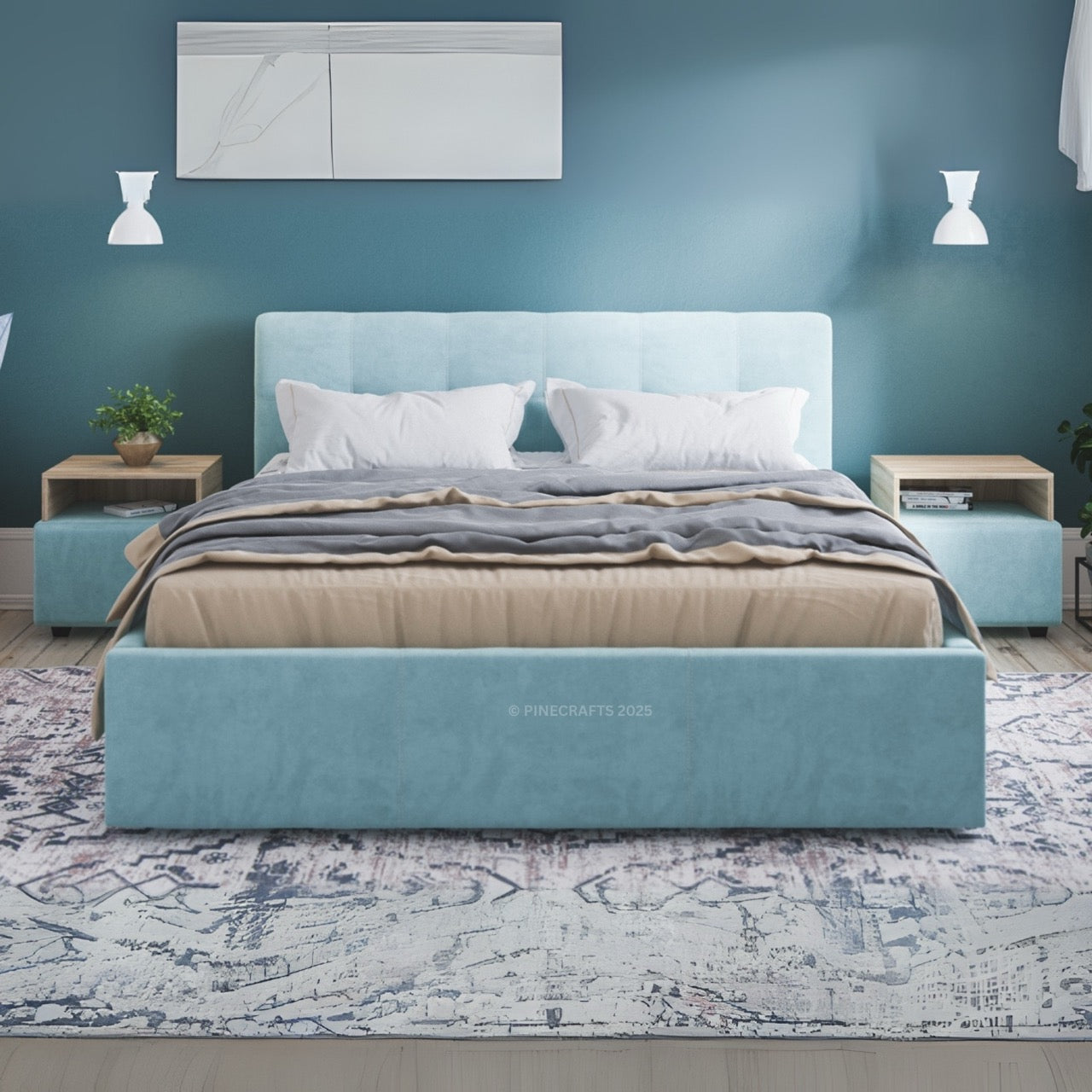 Blue upholstered bed in a room with a blue wall and decorative elements.