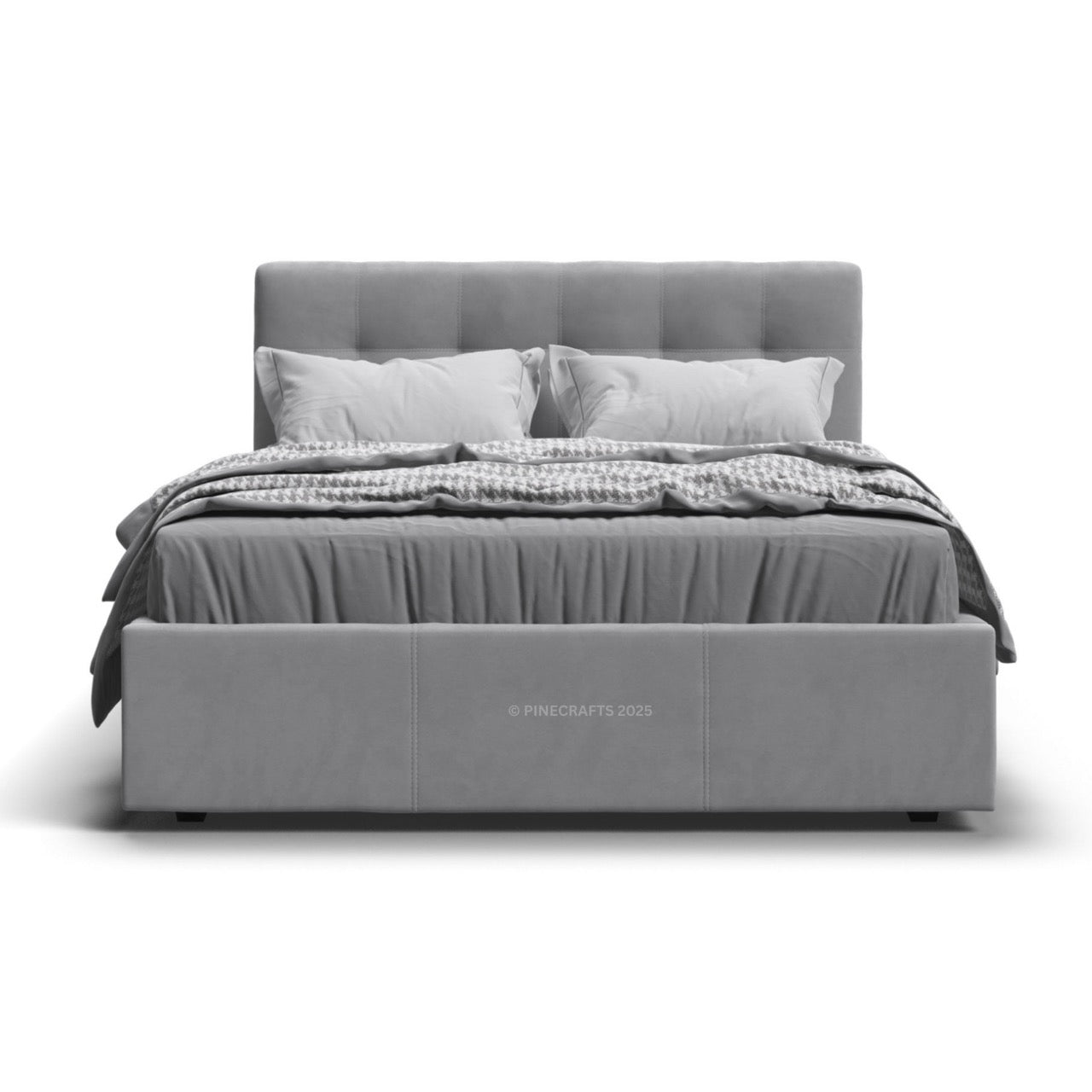 Gray upholstered bed with bedding on a white background