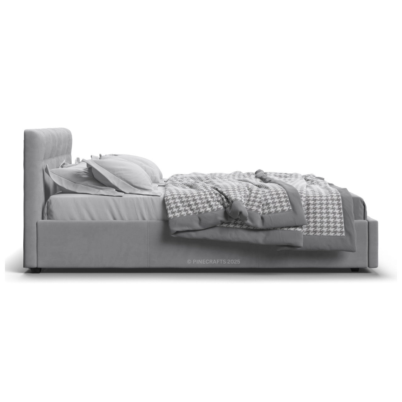 Gray bed with a textured blanket on a white background