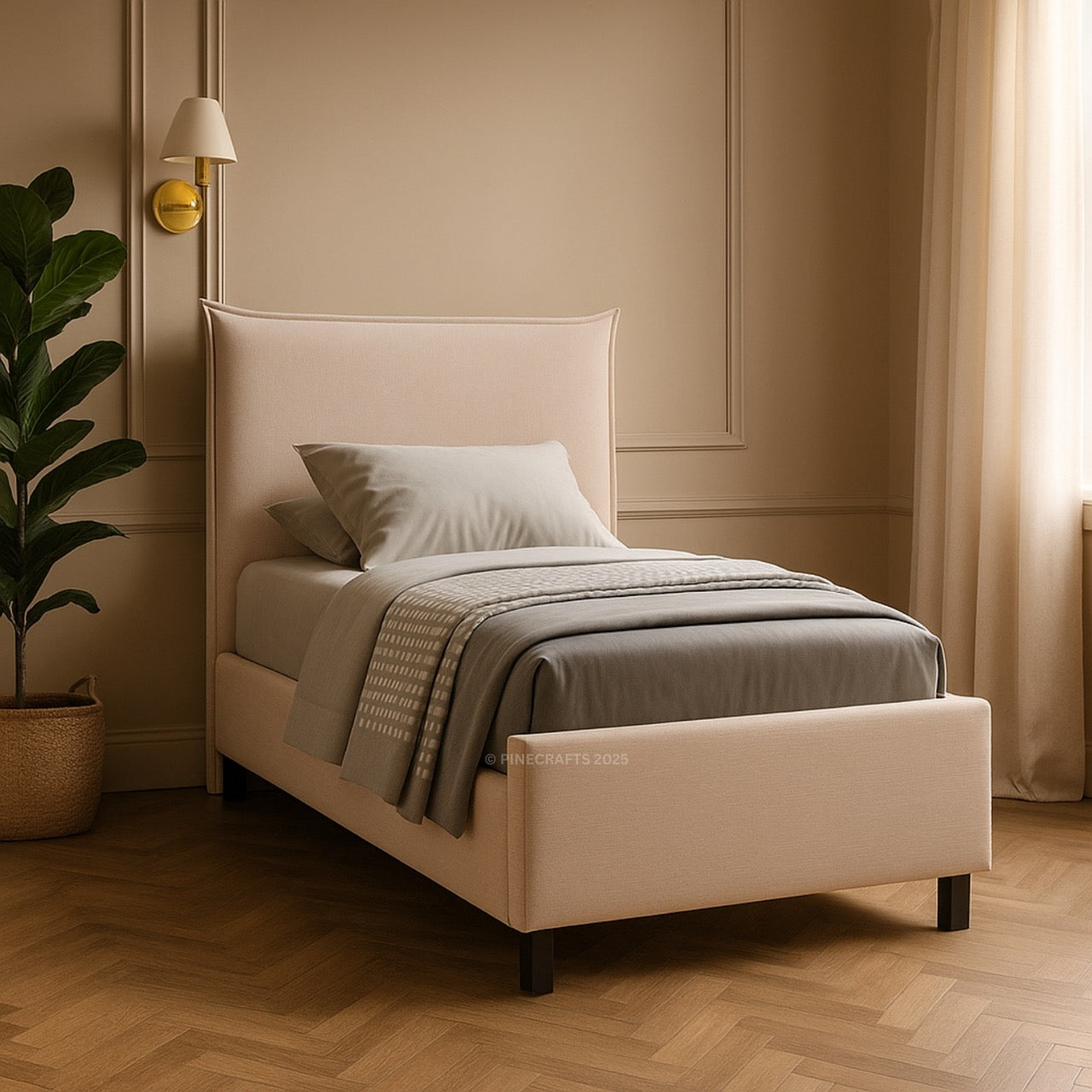 Beige upholstered bed with gray bedding in a warm-toned bedroom.
