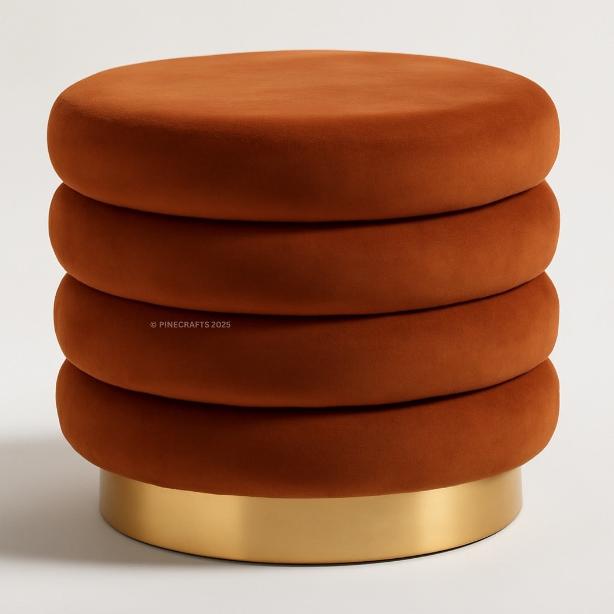 Stack of brown ottomans with a gold base on a white background