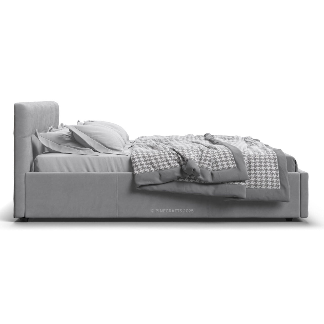 Gray upholstered bed with a checkered blanket on a white background
