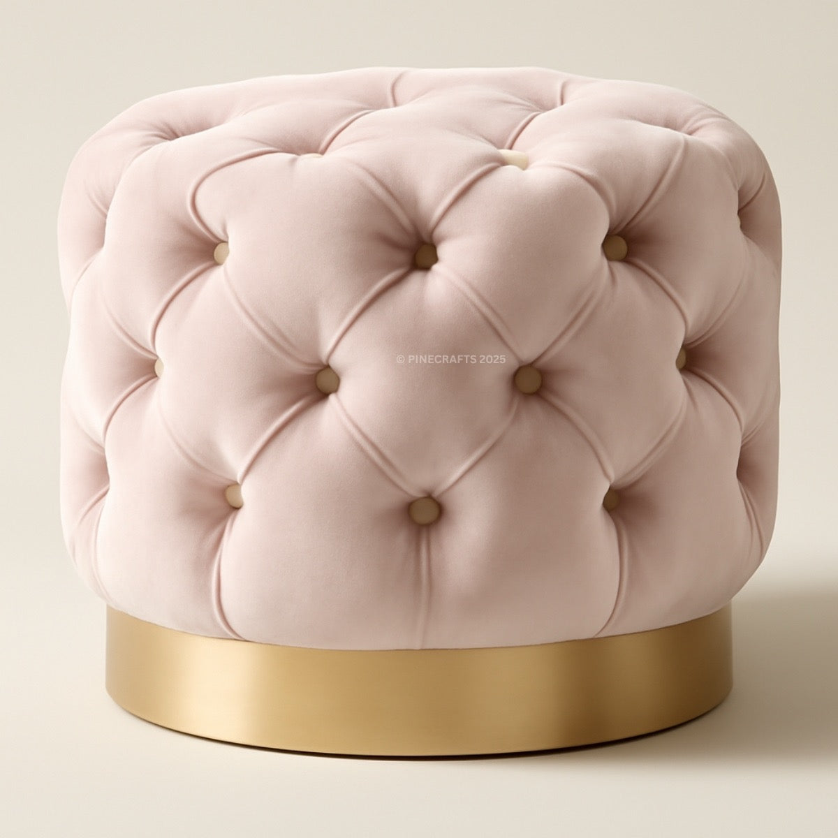 Pink tufted stool with a gold base on a beige background