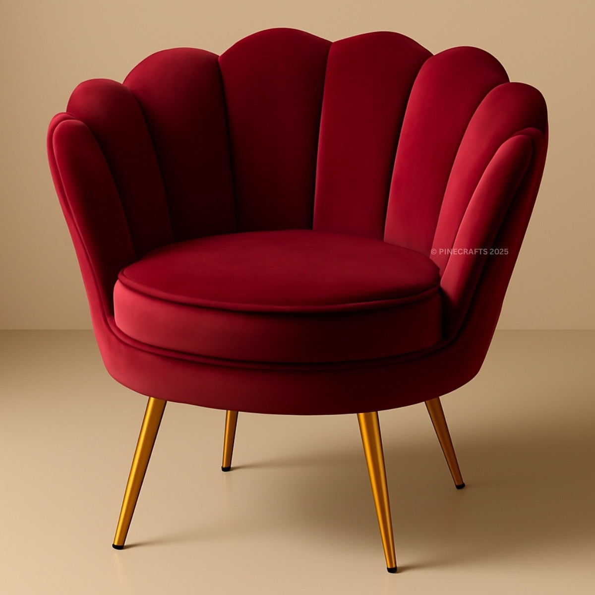 Red velvet armchair with gold legs on a beige background