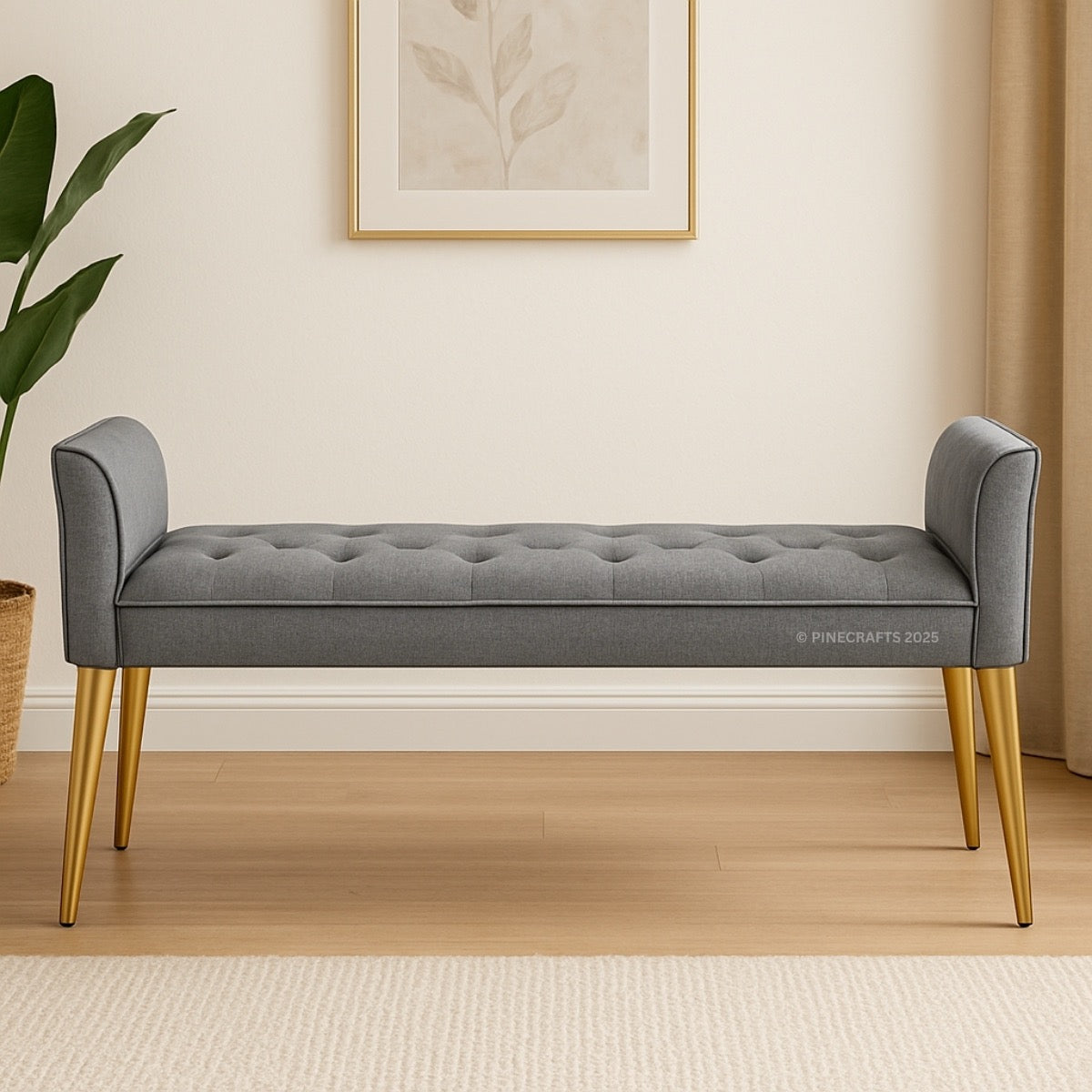 Gray tufted bench with gold legs in a room setting