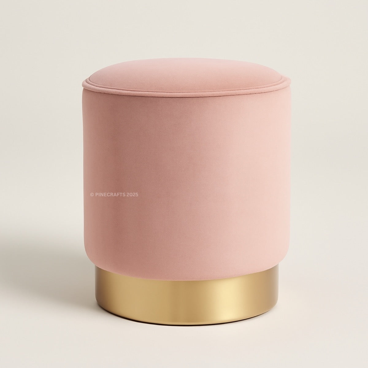 Pink ottoman with gold base on a white background