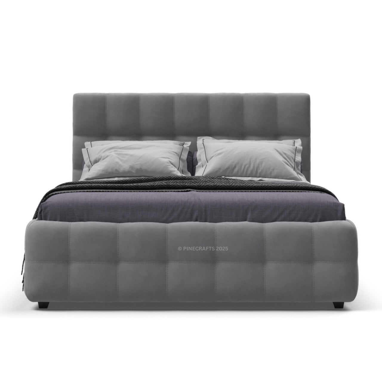 Gray upholstered bed with pillows on a white background