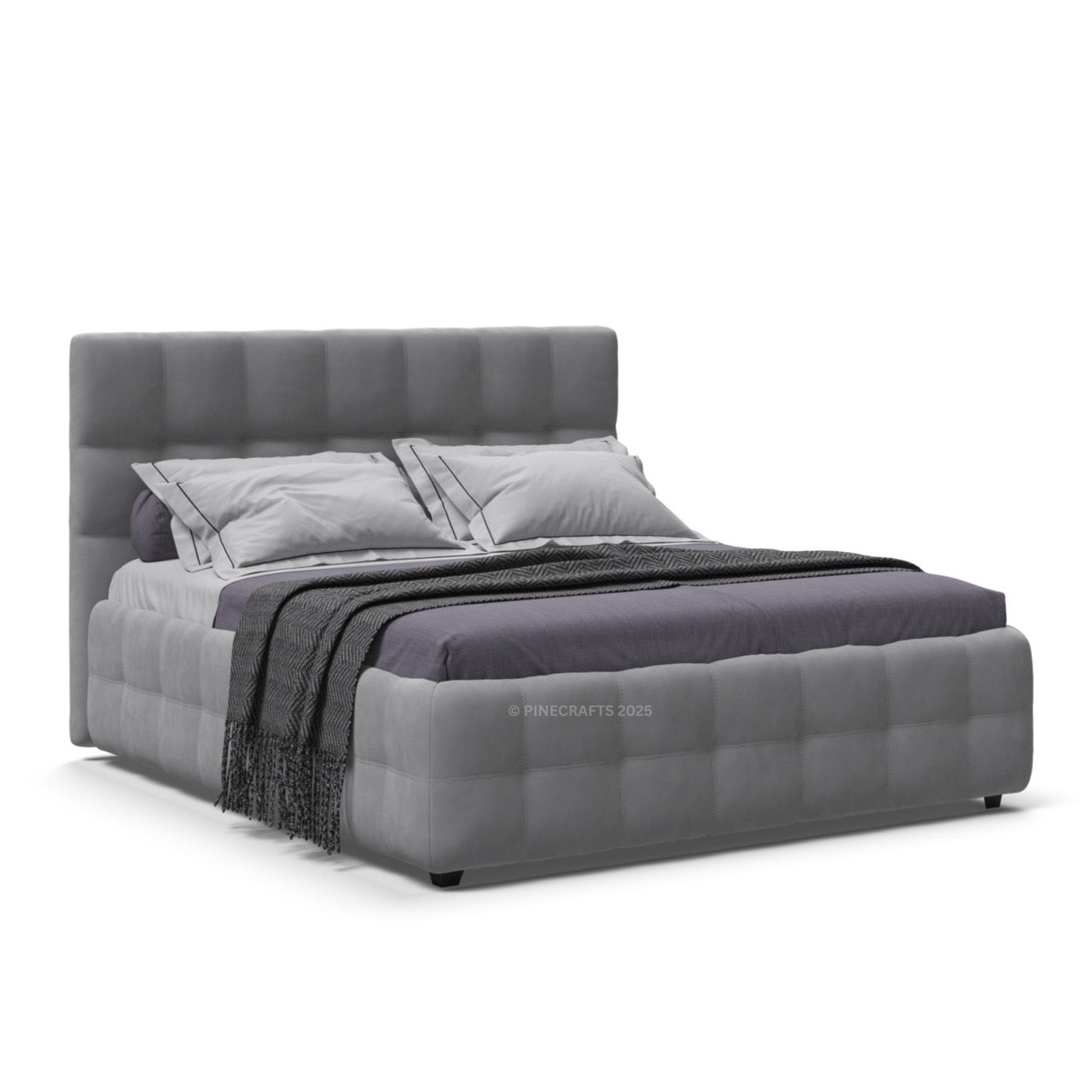Gray upholstered bed with pillows and a blanket on a white background