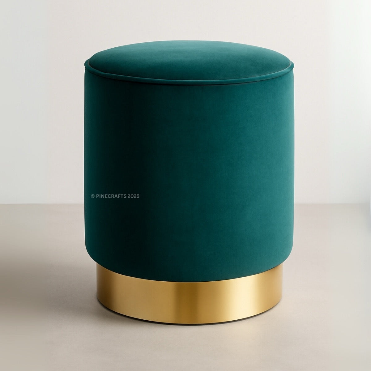 Teal stool with gold base on a light background