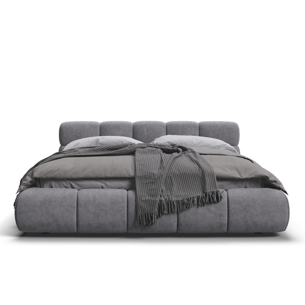 Gray upholstered bed with a blanket on a white background