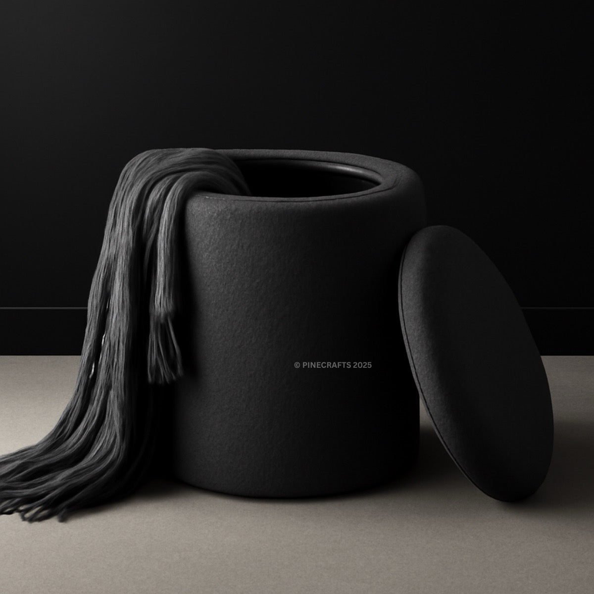 Black textured storage jar with a lid and gray scarf on a dark background