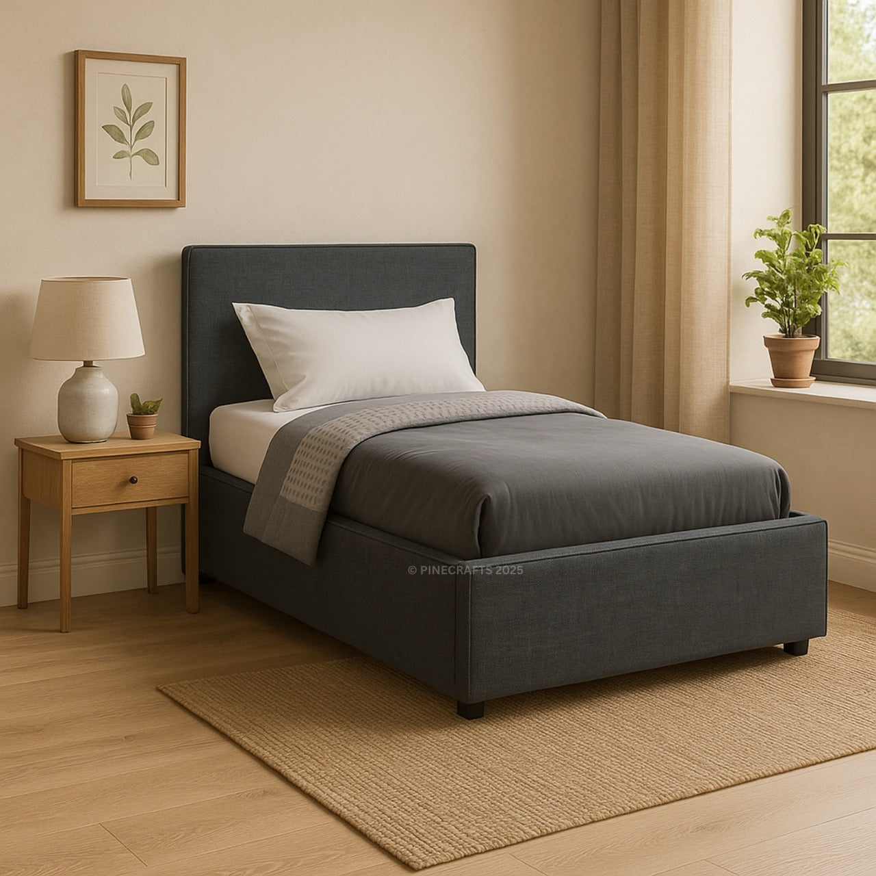 Bedroom with a dark gray upholstered bed, wooden nightstand, and lamp.