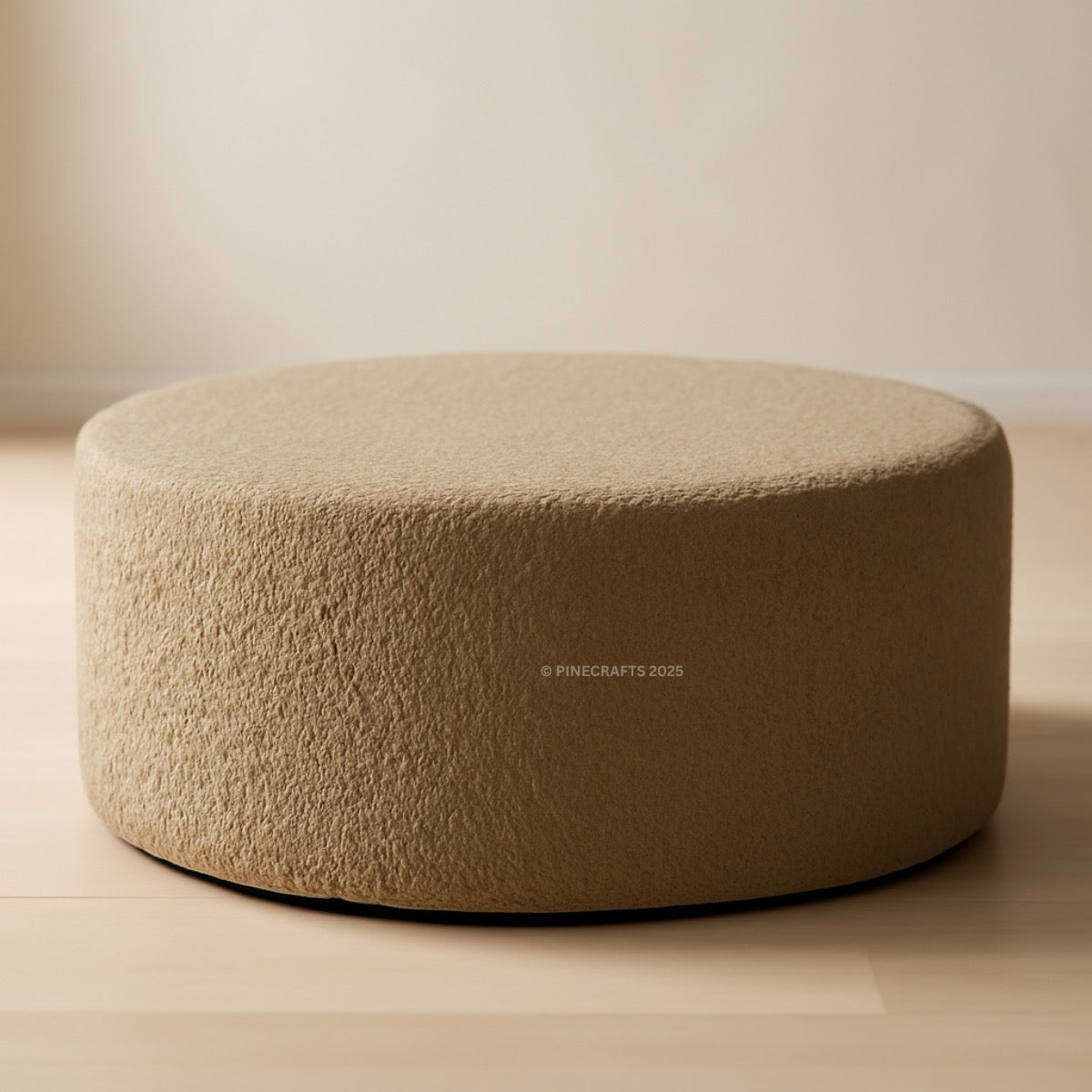 Beige ottoman on a neutral background