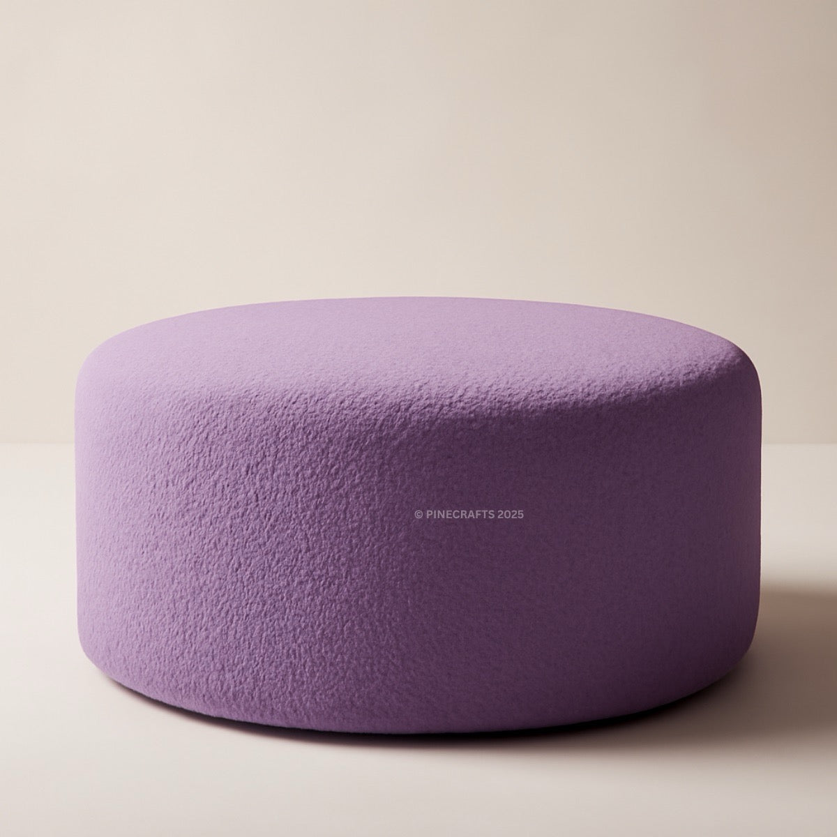 Purple pouf on a beige background