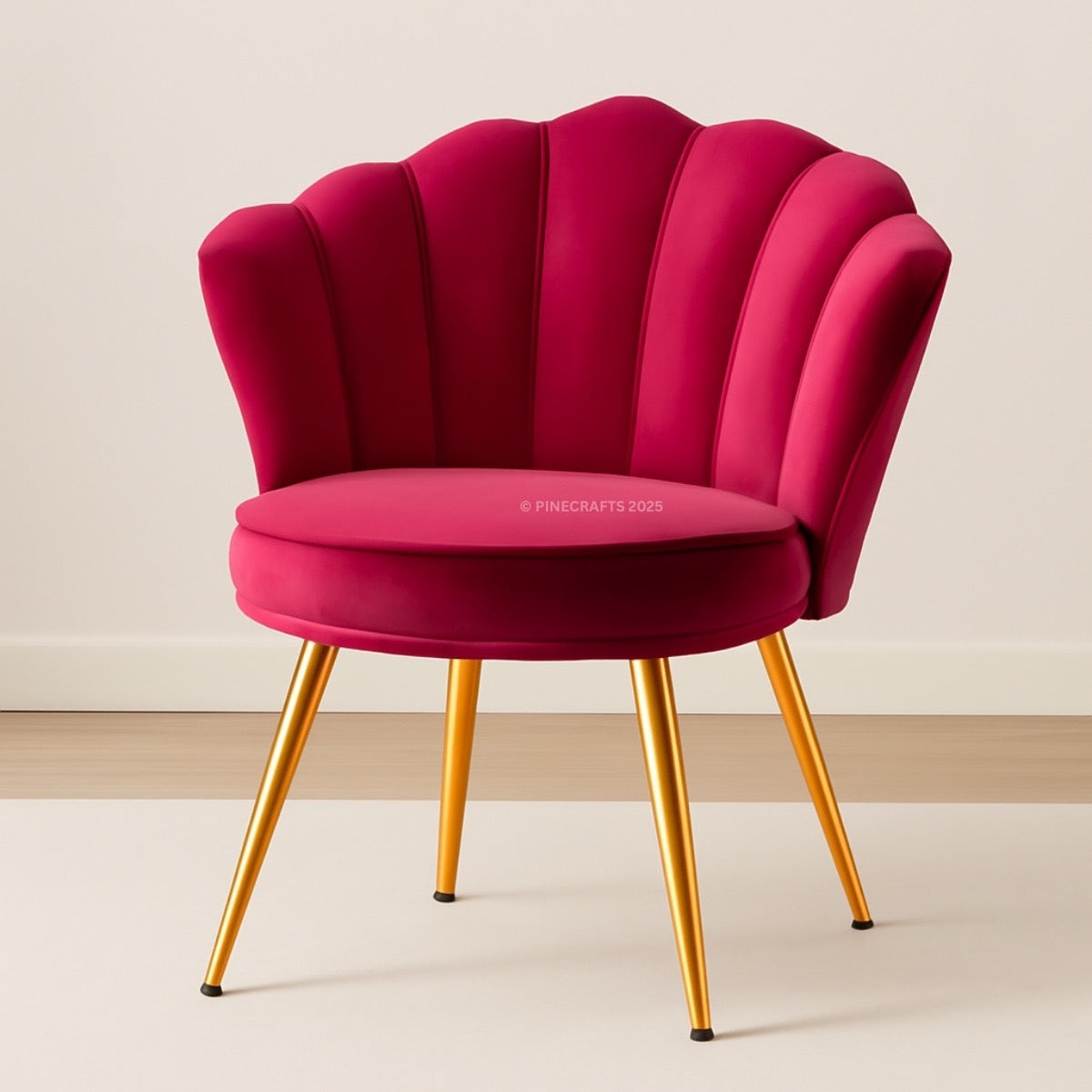 Pink chair with gold legs on a light background