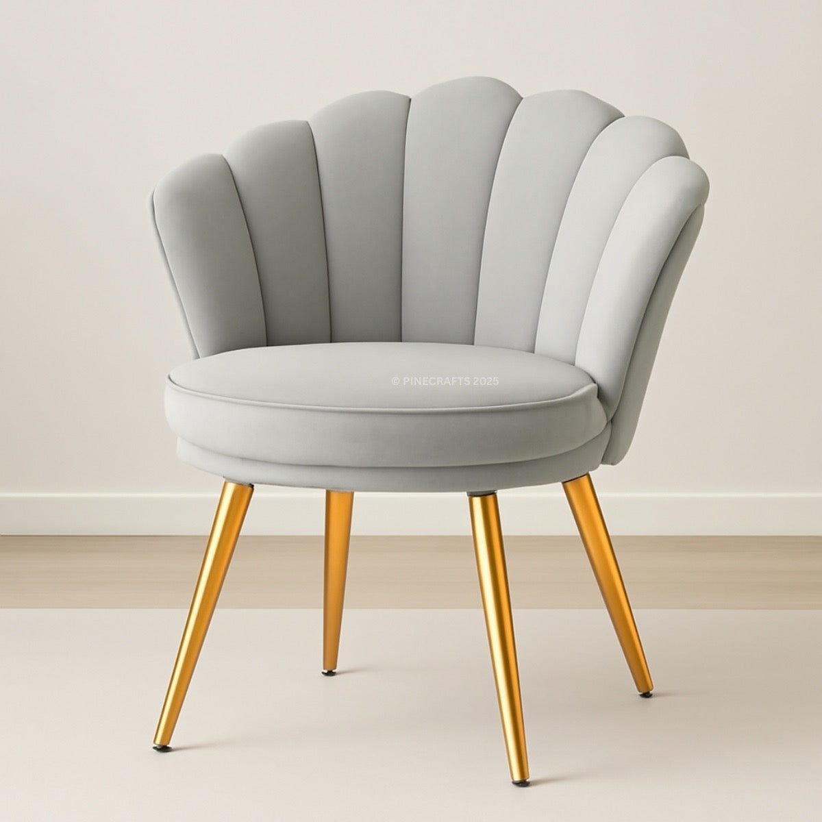 Gray chair with gold legs on a plain background