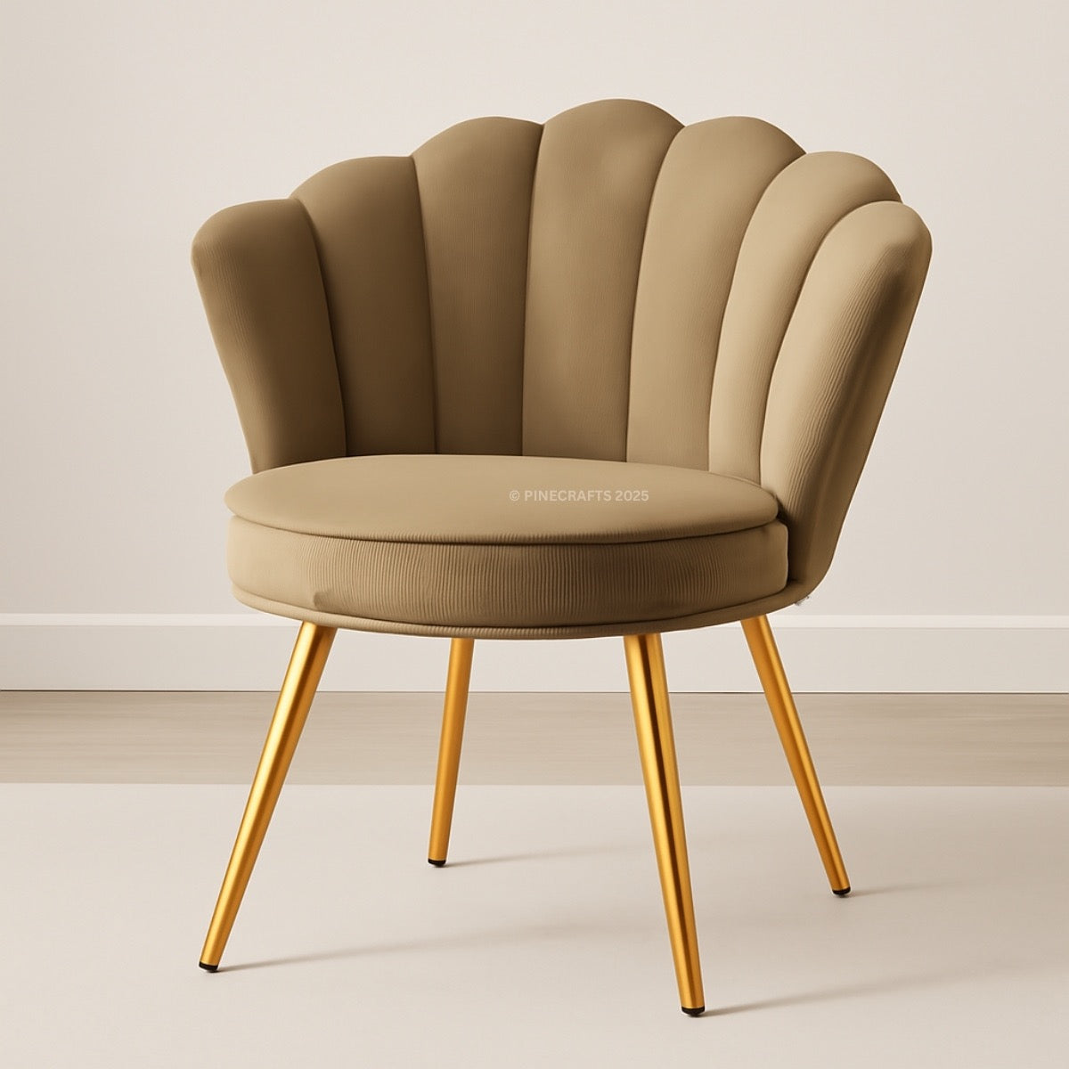 Beige chair with scalloped backrest and gold legs on a plain background