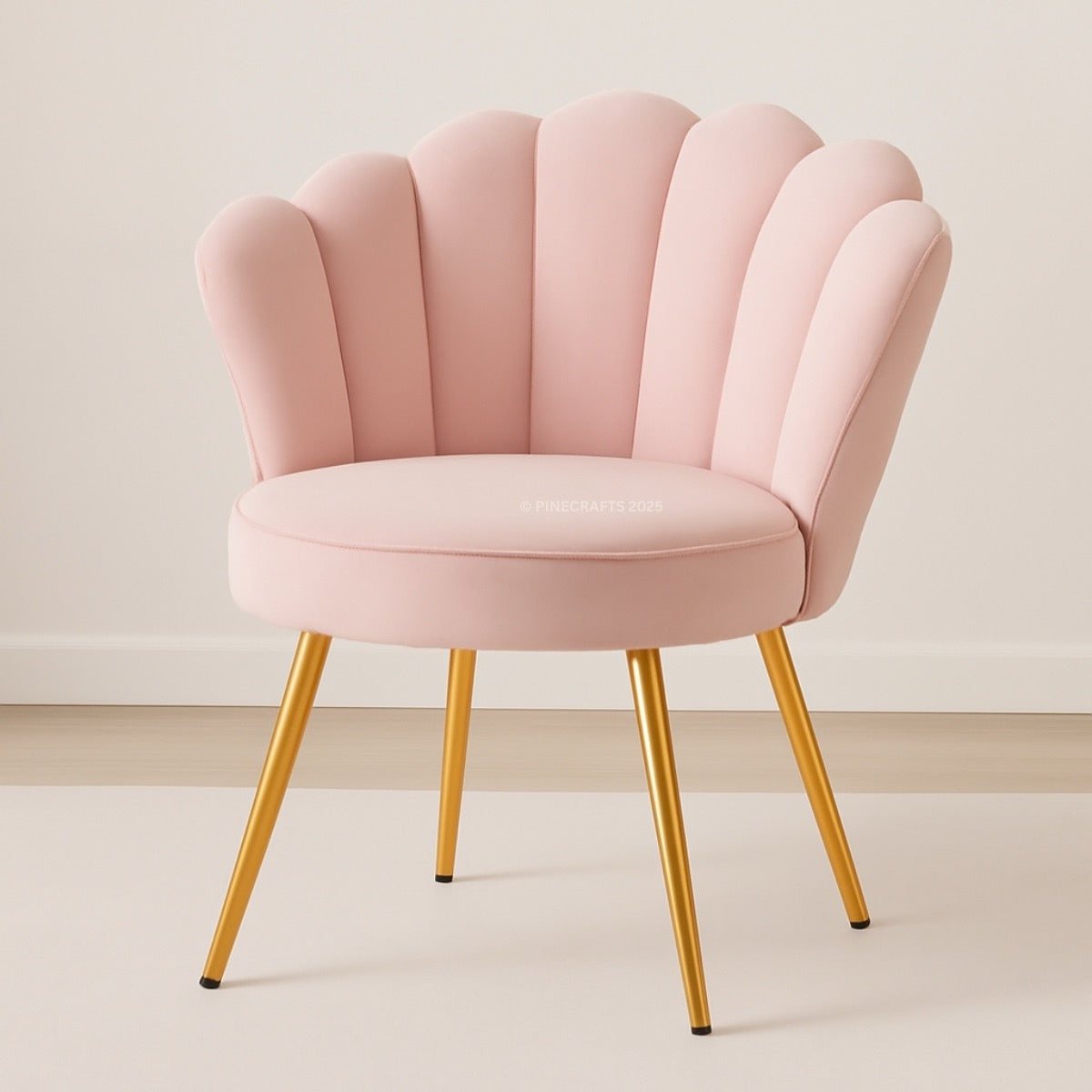 Pink chair with scalloped backrest and gold legs on a neutral background