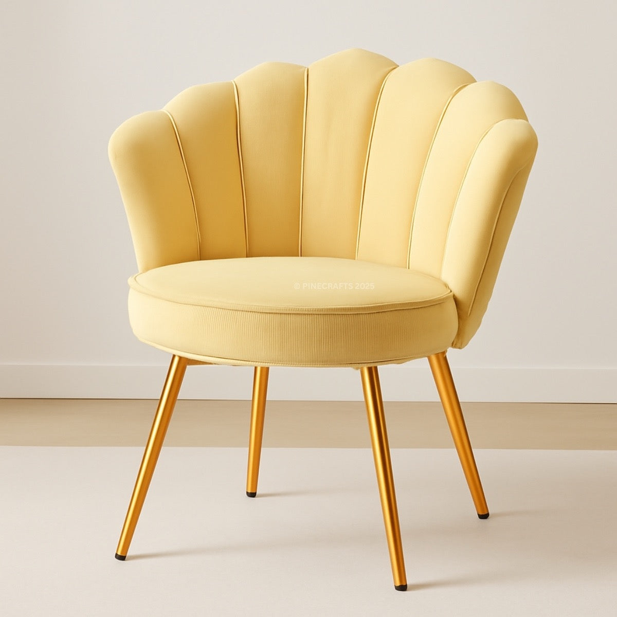 Yellow armchair with gold legs on a plain background