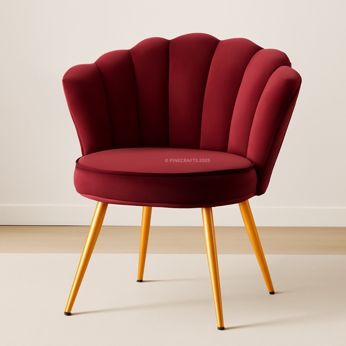 Red chair with gold legs on a beige background