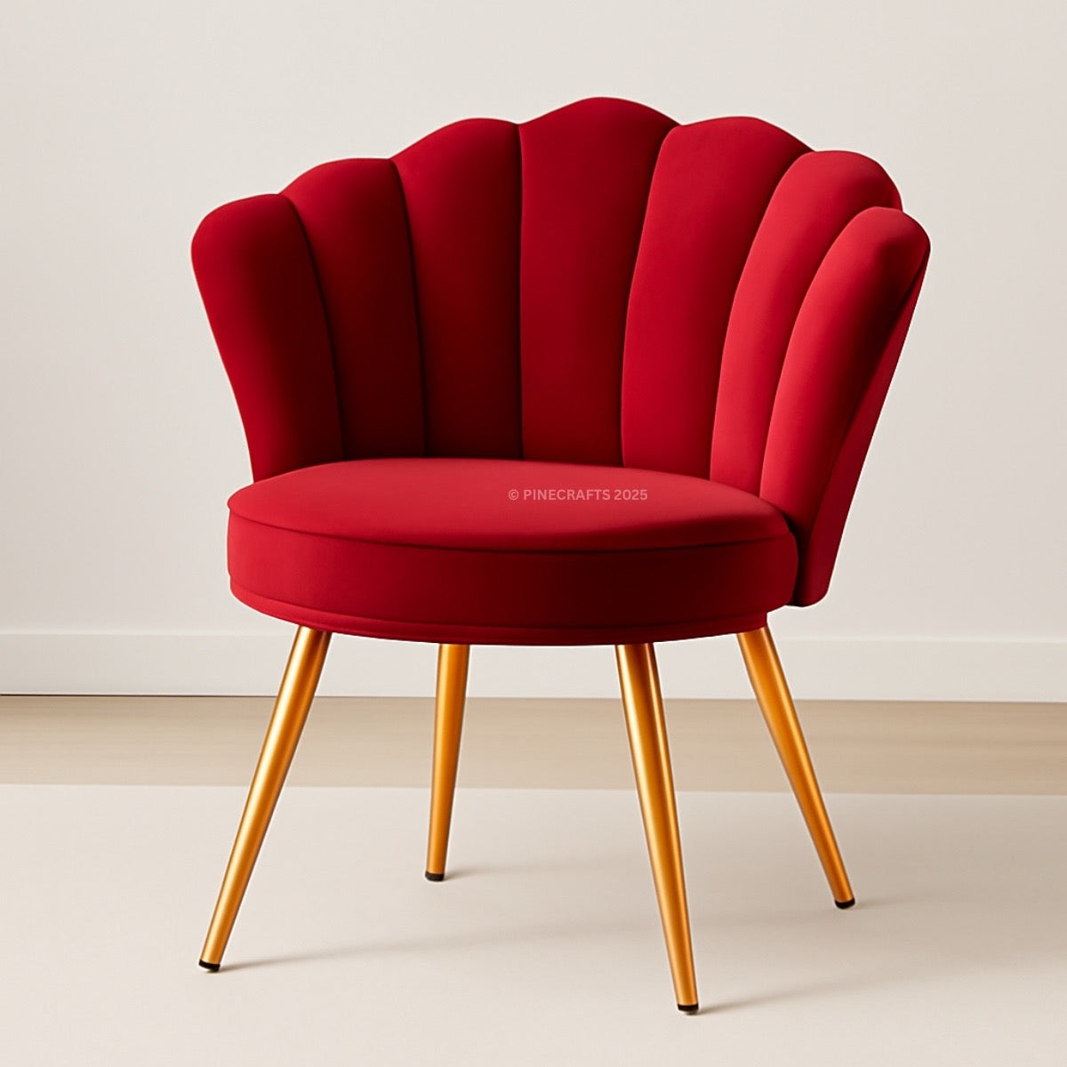 Red shell-back chair with gold legs on a white background