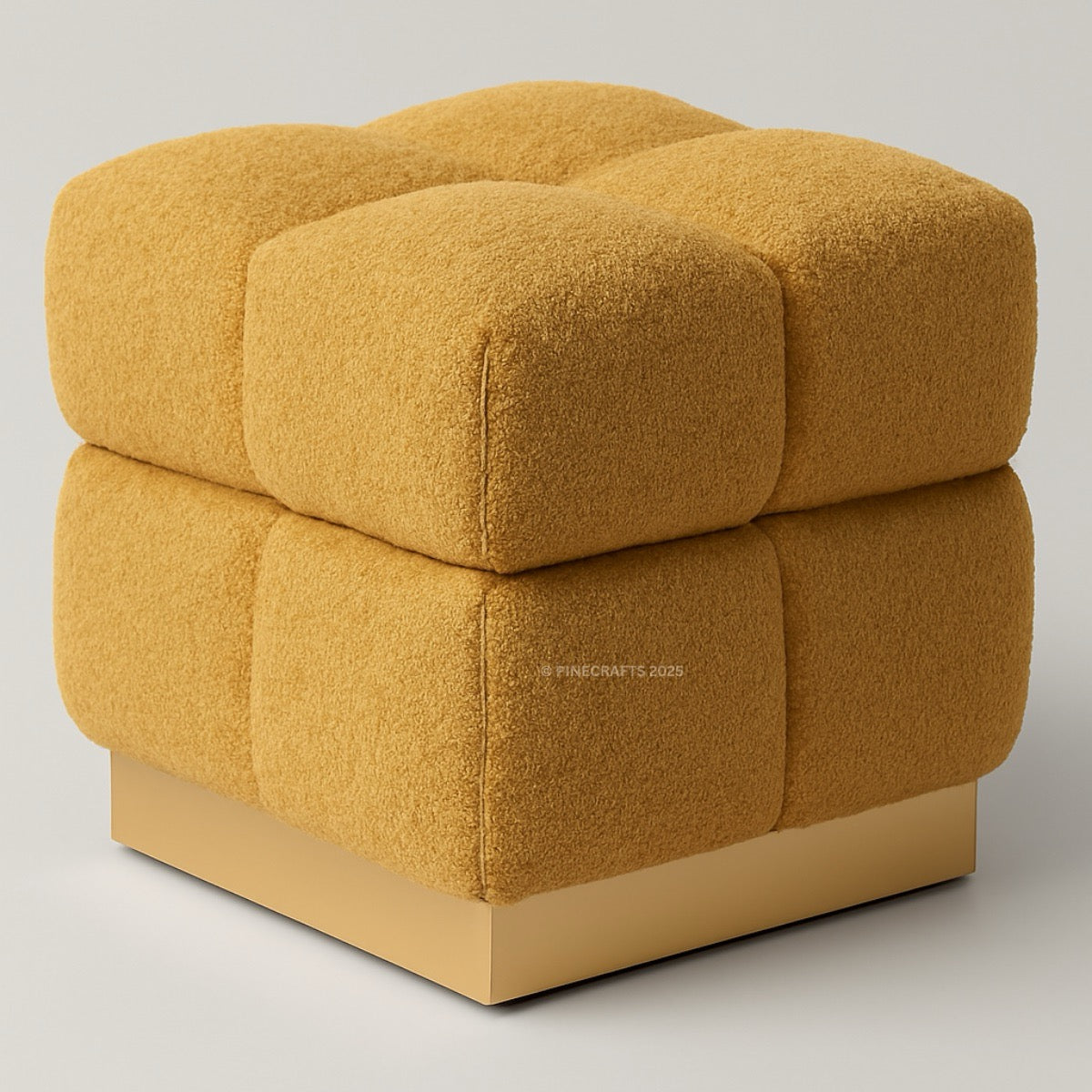 Yellow textured cube-shaped ottoman on a light gray background