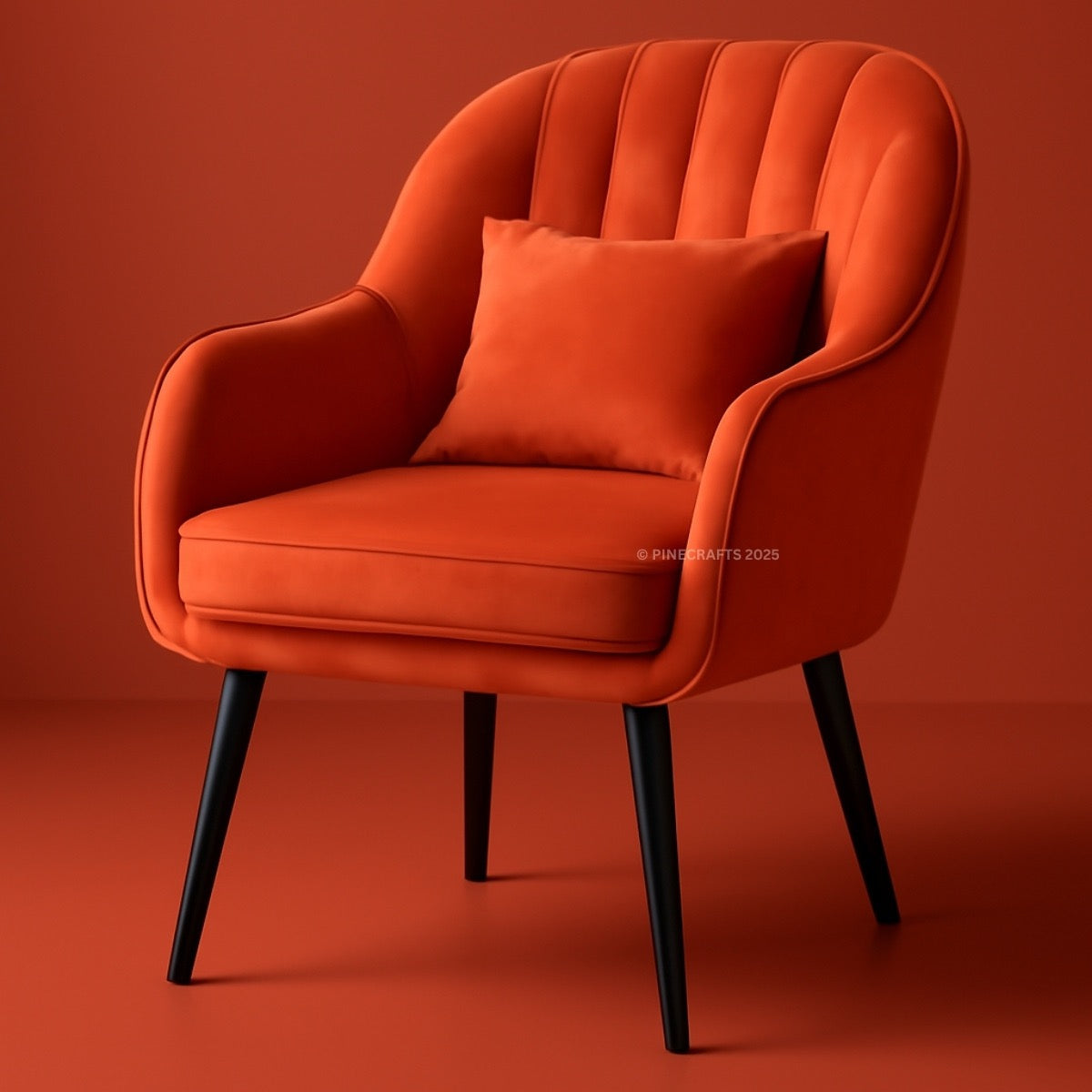 Orange armchair with a pillow on a red background
