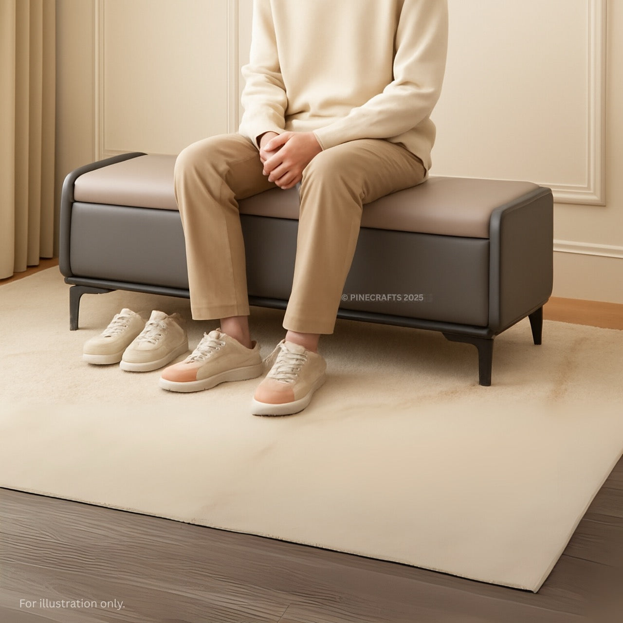 Person sitting on a modern ottoman in a room with wooden flooring and beige walls.