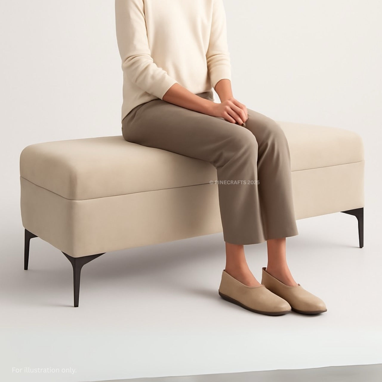 Person sitting on a beige ottoman wearing beige pants and shoes.