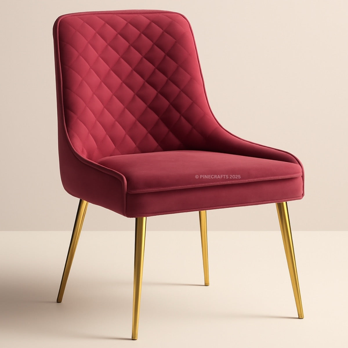 Red quilted chair with gold legs on a beige background