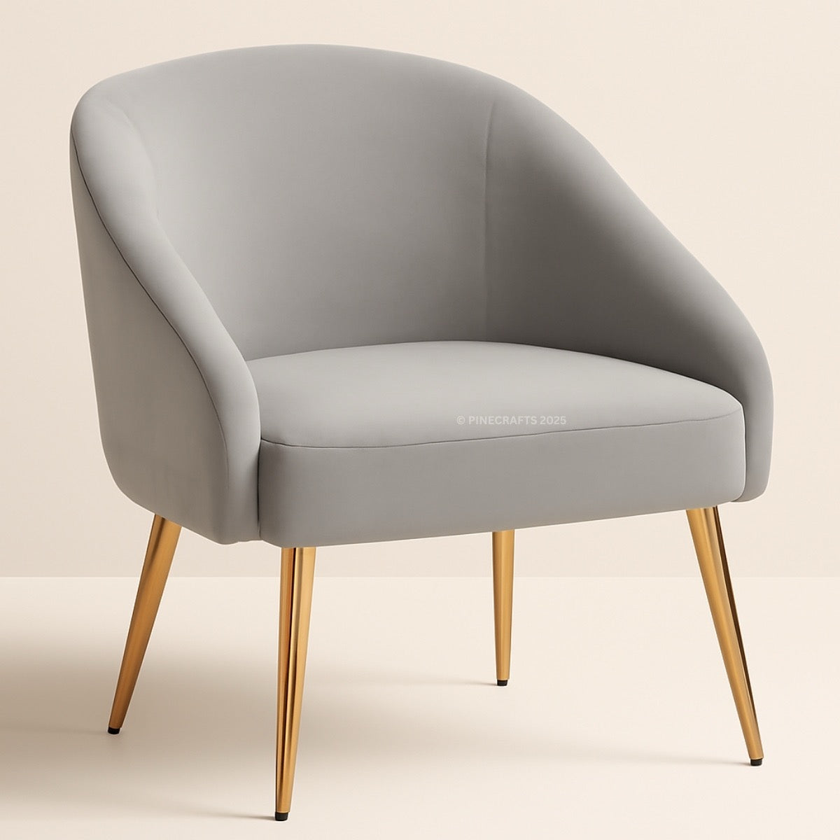 Gray armchair with gold legs on a beige background