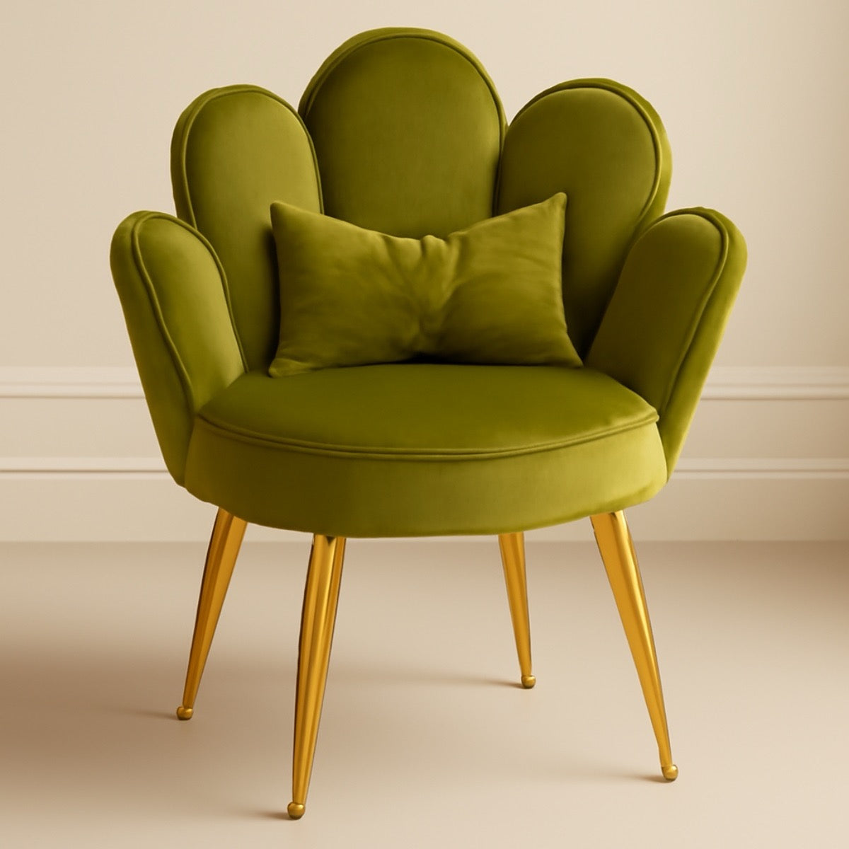 Green armchair with gold legs on a beige background