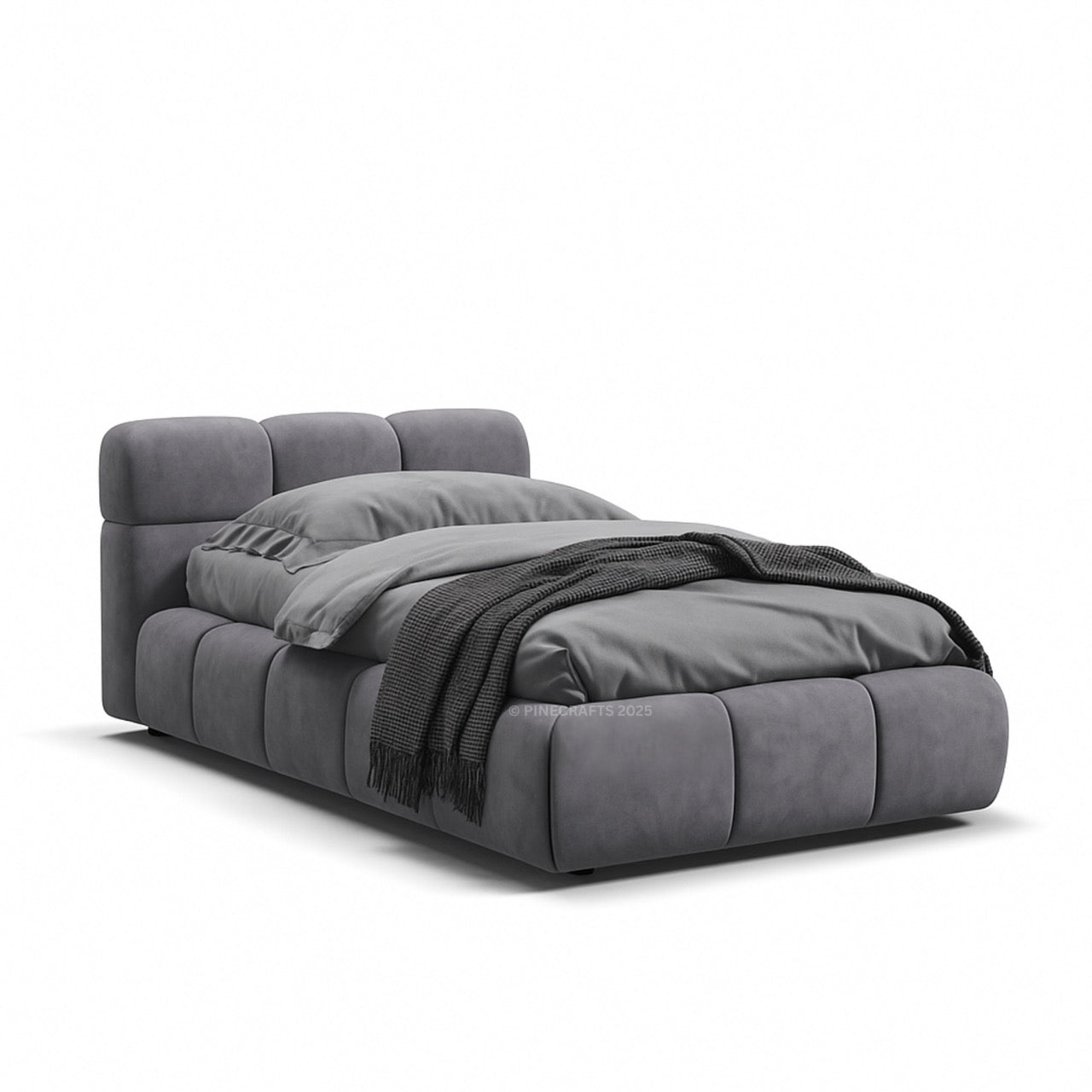 Gray upholstered bed with a blanket on a white background