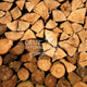 Stacked solid wood logs for furniture, raw material at CRUZ INTERNATIONAL Furniture Store