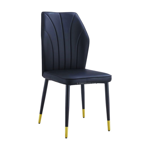 Black chair with gold accents on a white background