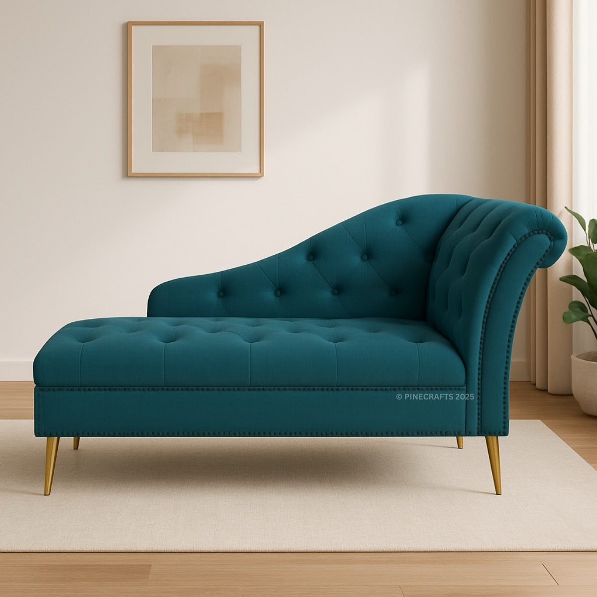 Teal chaise lounge in a room with a framed picture on the wall.