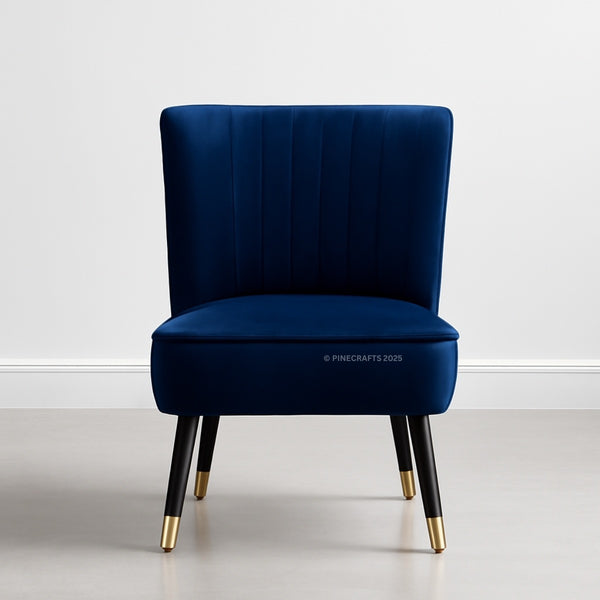 Blue velvet chair with gold feet on a white background