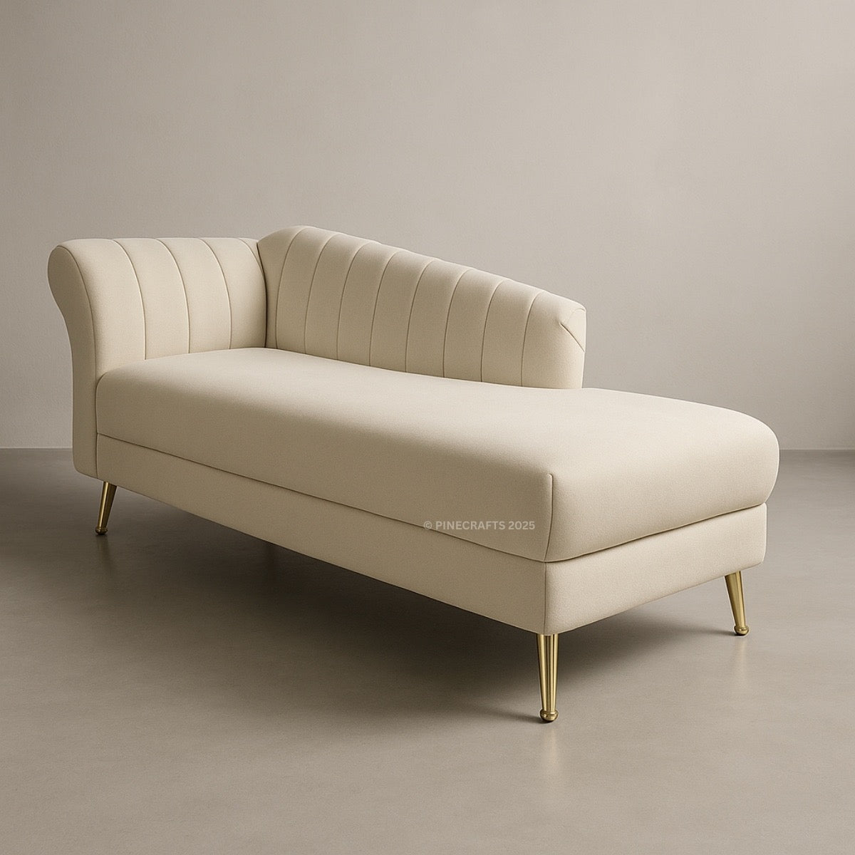 Beige chaise lounge with gold legs on a neutral background
