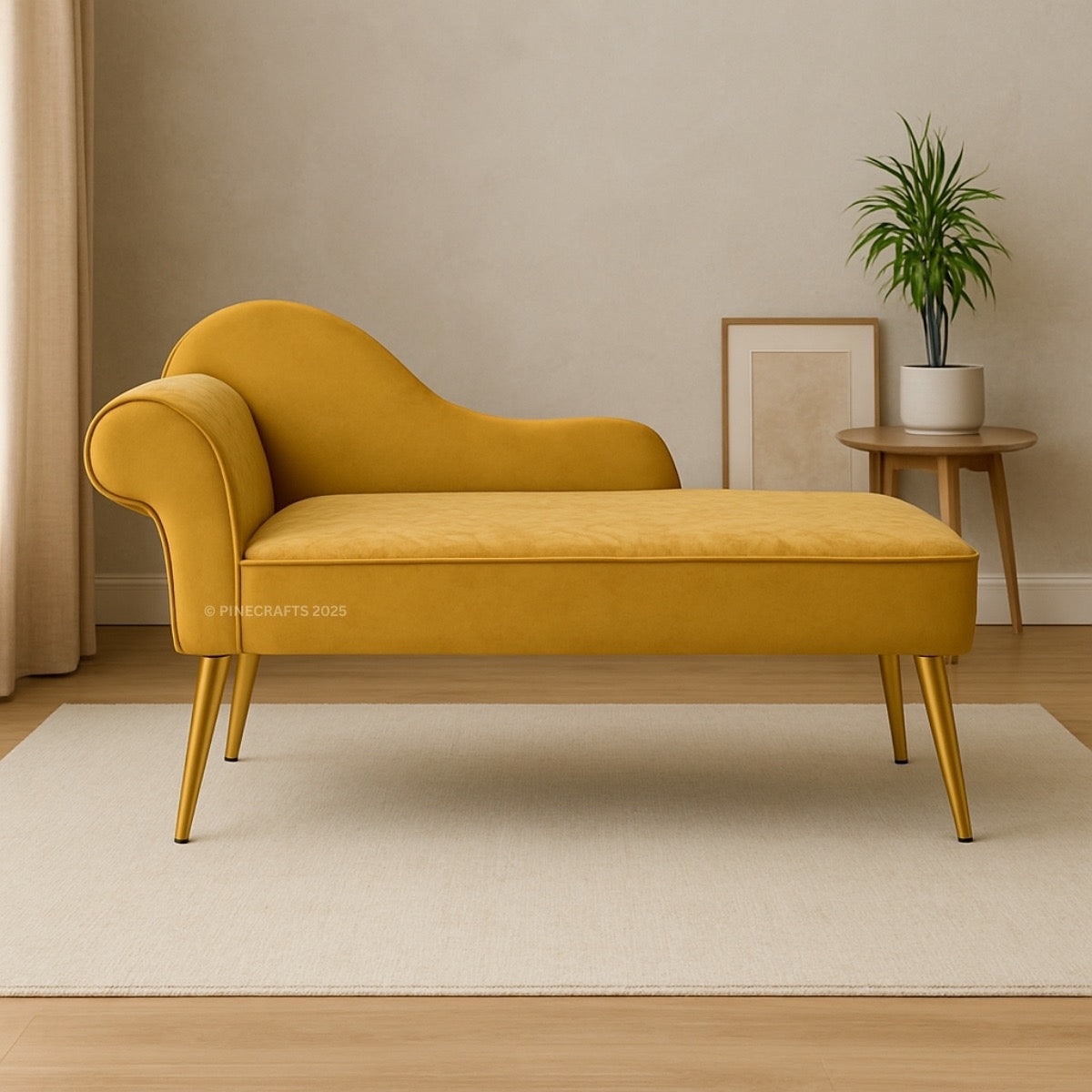 Mustard yellow chaise lounge in a room with a plant and table.