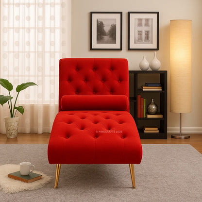 Red tufted chair with gold legs in a living room setting.