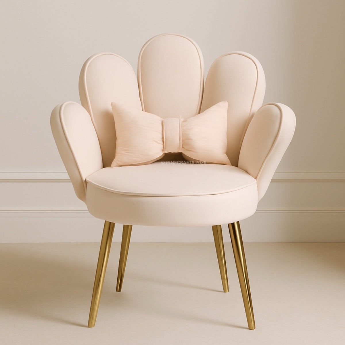 Beige armchair with a decorative bow on a neutral background