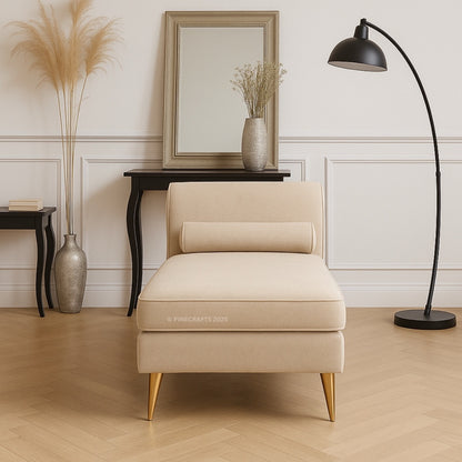 Beige armchair in a stylish room with a mirror, lamp, and decorative items.