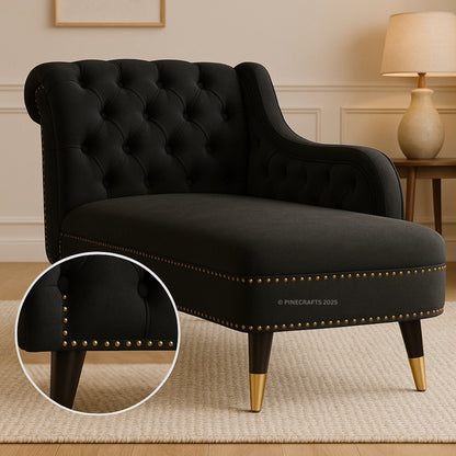 Black tufted armchair with gold nailhead trim in a room setting, Pinecrafts brand visible.