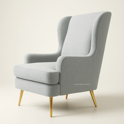 Gray armchair with gold legs on a light beige background