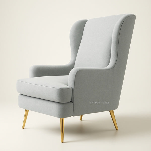 Gray armchair with gold legs on a light beige background