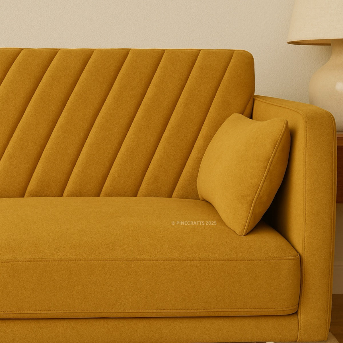 Yellow sofa with a pillow in a room setting