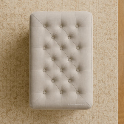 Beige tufted ottoman on a beige carpet