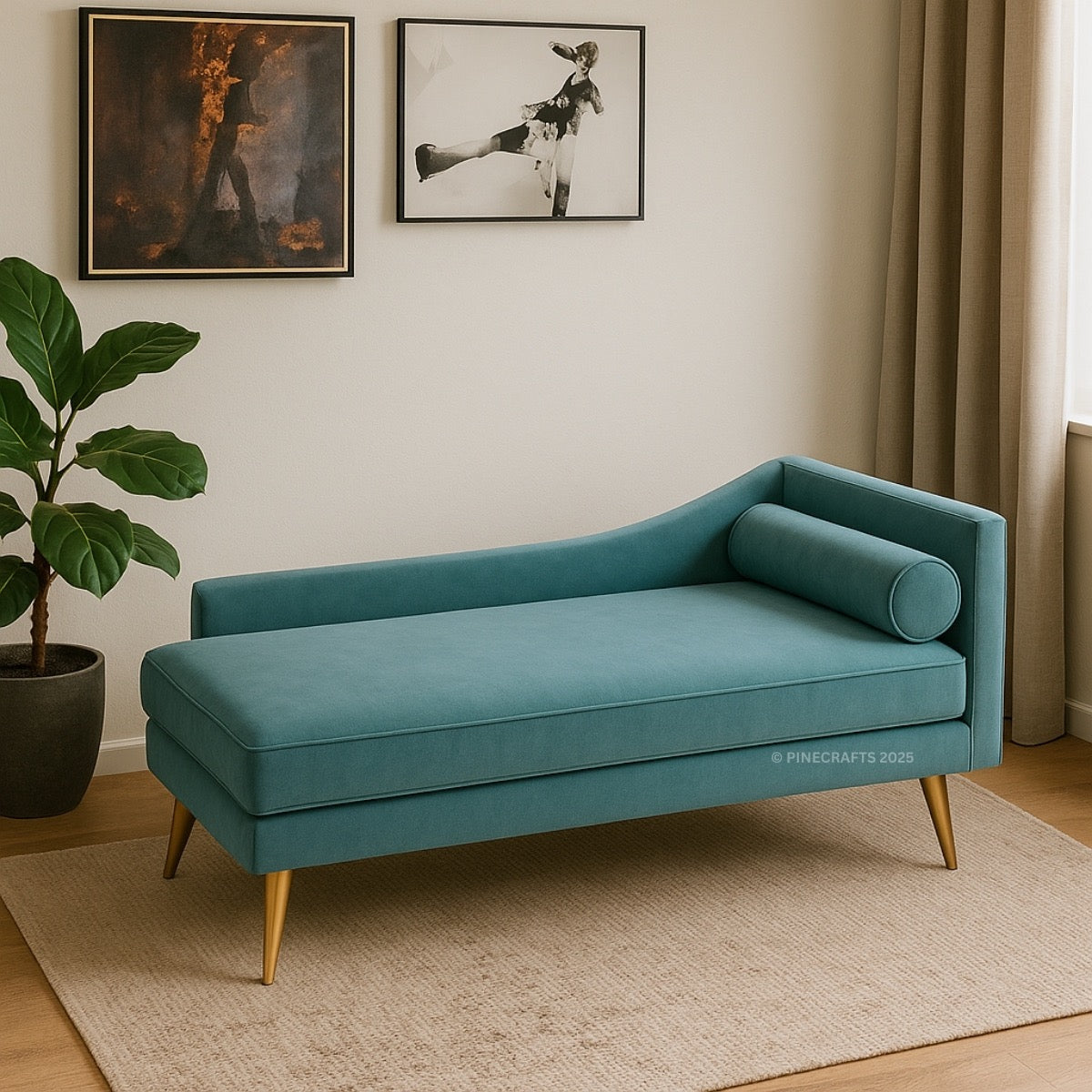 Teal sofa in a room with a plant and framed pictures on the wall.
