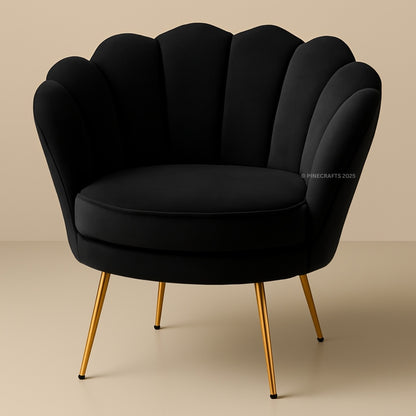 Black armchair with gold legs on a beige background